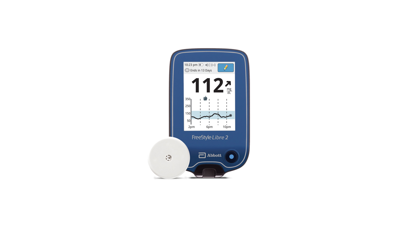  FreeStyle Libre 2 reader showing a glucose reading