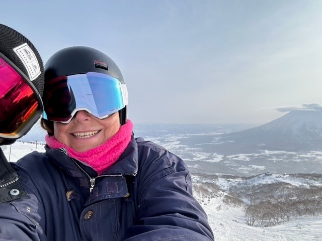 Jenni taking a selfie with a great view