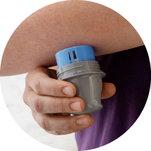Apply the sensor to the back of your upper arm with the applicator.
