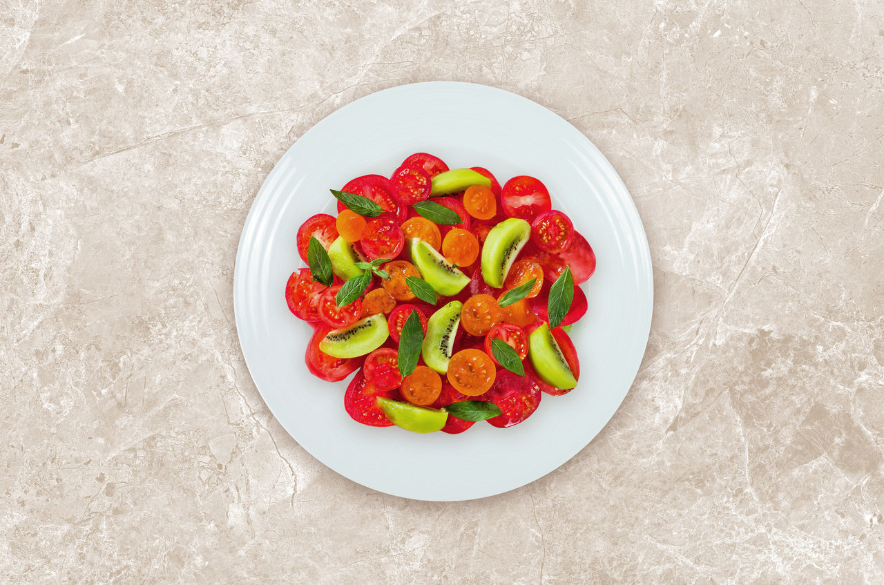 Salade tomates kiwi